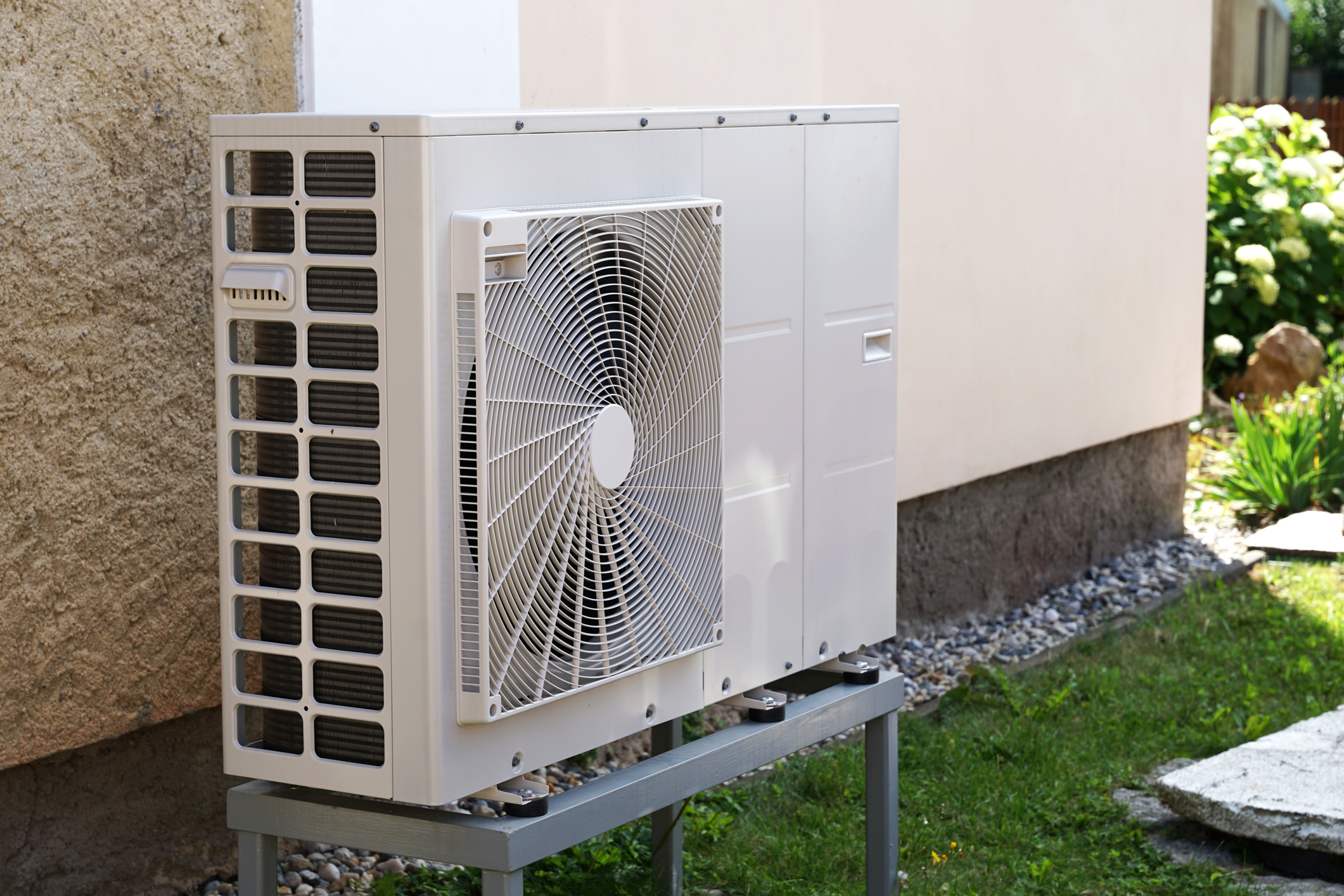Heat pump mounted on the outside wall of an Ohio home